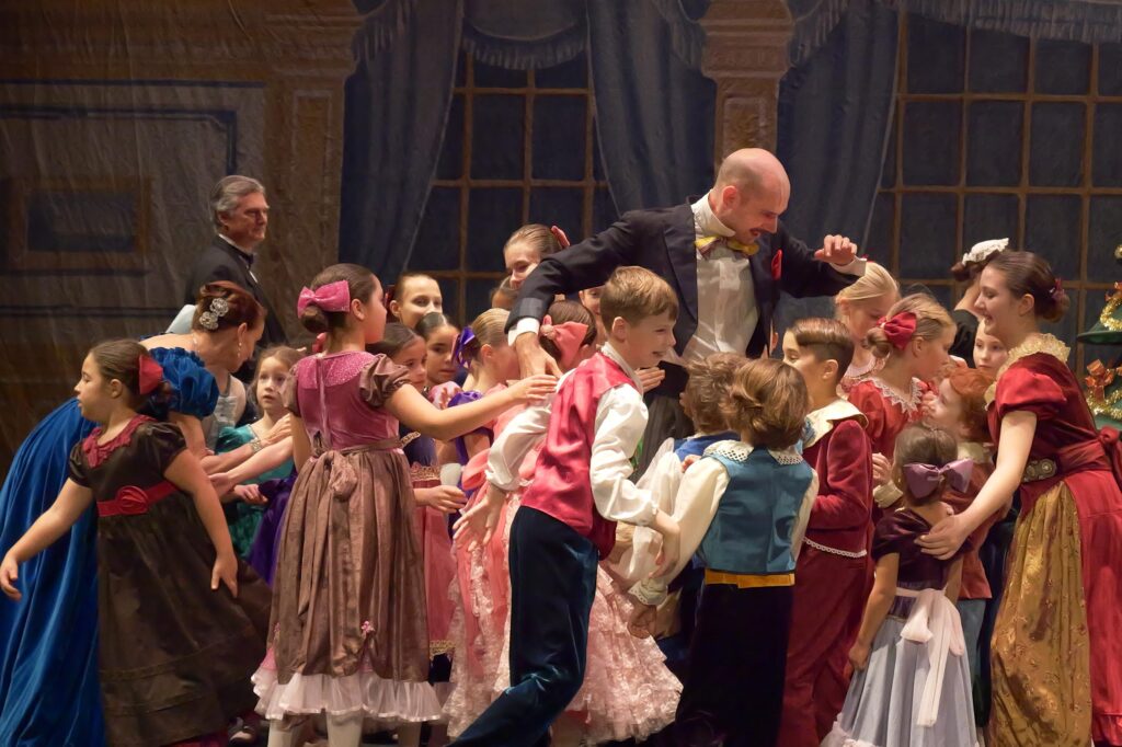 Drosselmeyer and Kids on stage in Nutcracker