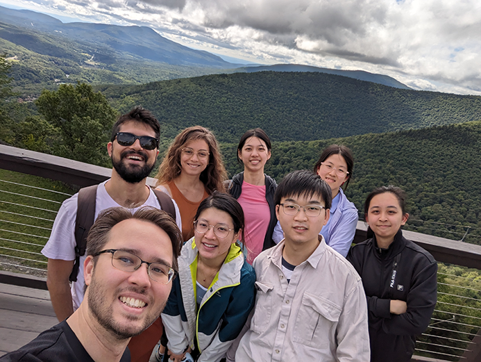 Group of students with mountains in background